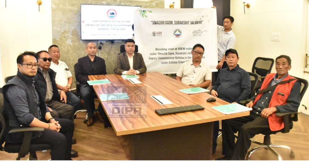 DC Kohima, B Henok Buchem with officials and village representatives during the release of Solid Waste Management (SWM) Rules Handbook 2026 held at DC’s Office Chamber, Kohima on June 5. (DIPR Photo)